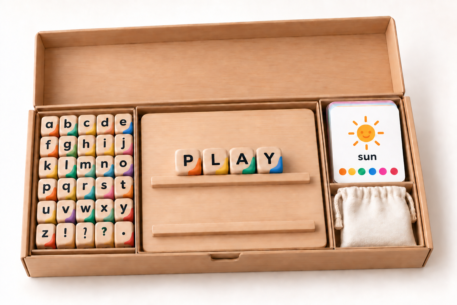 An open natural wooden Tingle Learning Box with alphabet blocks, a two-rail word board, memory cards, and a storage pouch